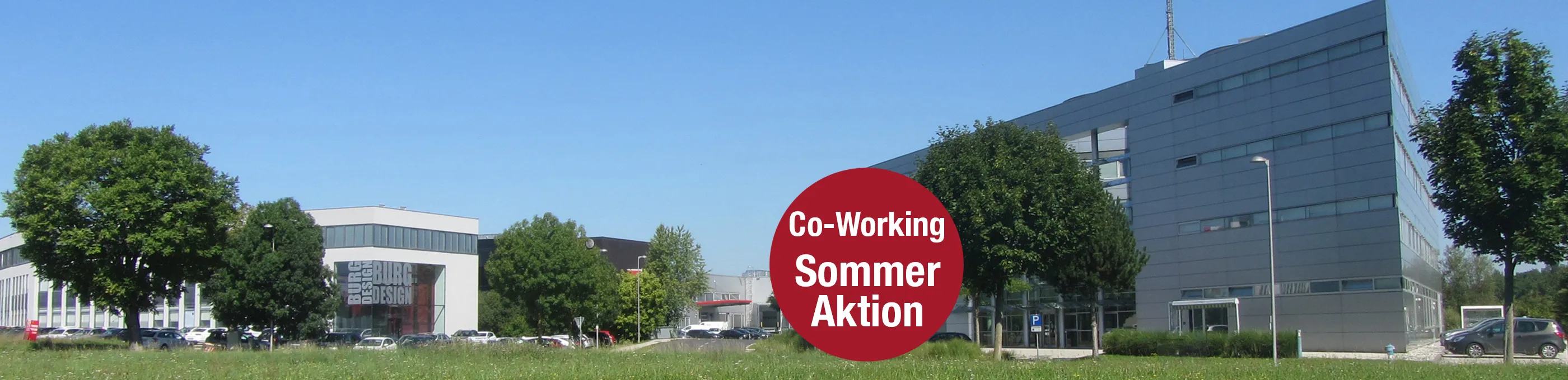 Header TIC Gebäude mit rotem Kreis Co-Working Sommer Aktion